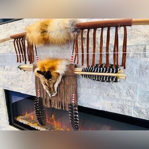 Hand made hickory bow and arrow set. 68” with 5 arrows. Enrolled Cherokee